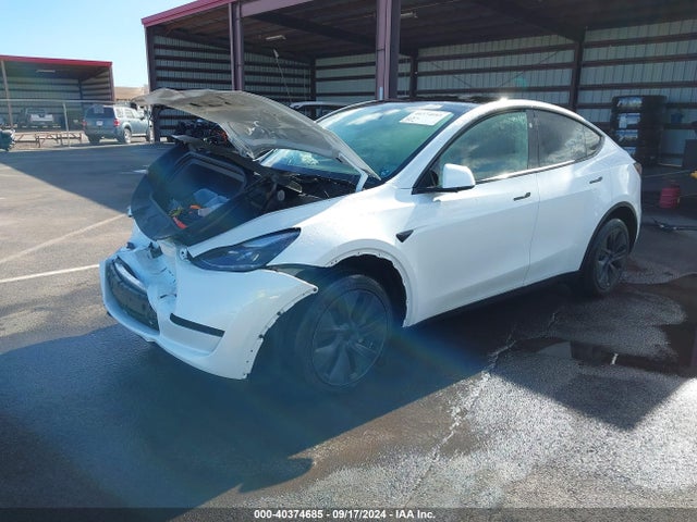 2024 TESLA MODEL Y 7SAYGDED2RF094899 Photo 1