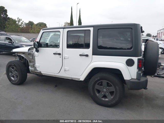 1C4BJWDG7FL637037 Jeep Wrangler Unlimited Freedom Edition