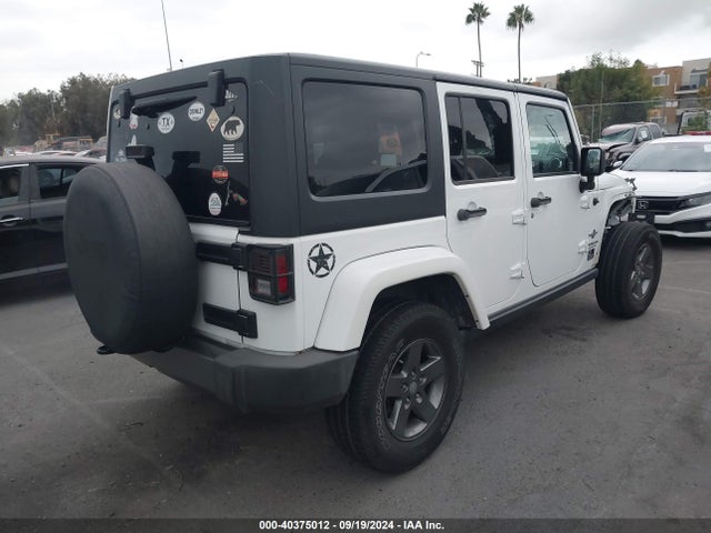 1C4BJWDG7FL637037 Jeep Wrangler Unlimited Freedom Edition