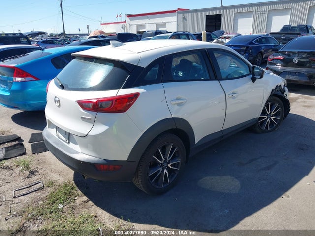 JM1DKDC76J0329895 Mazda Cx-3 Touring