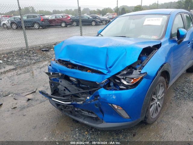 JM1DKFC72H0149562 Mazda Cx-3 Touring