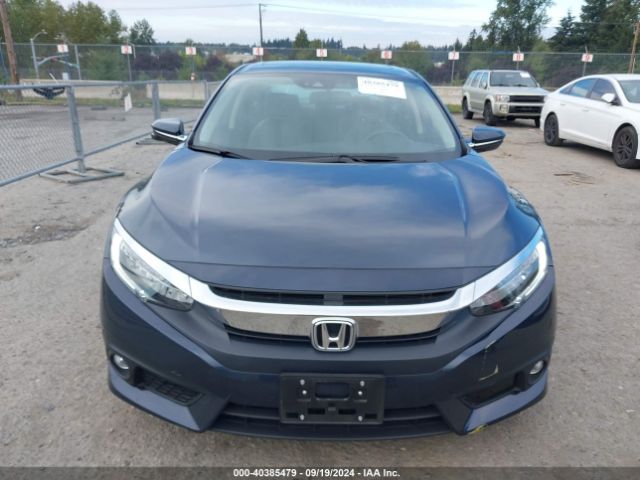 JHMFC1F94JX008591 Honda Civic Touring