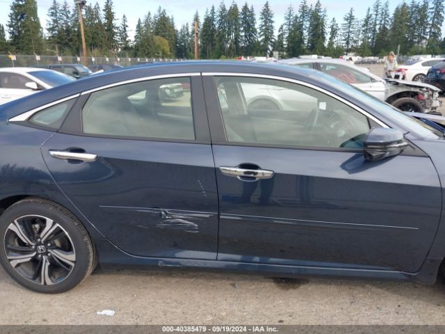JHMFC1F94JX008591 Honda Civic Touring