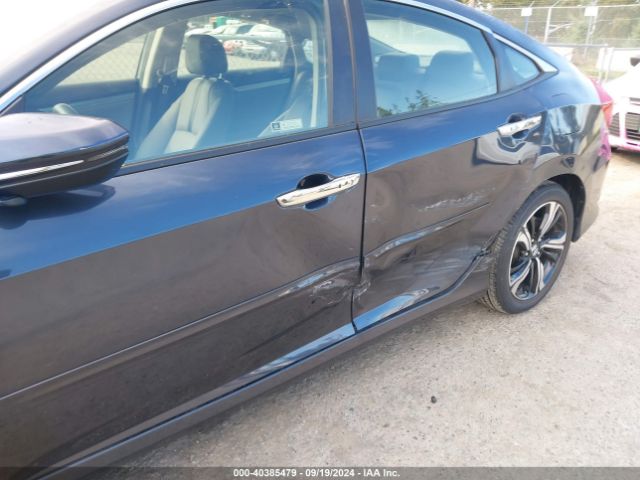 JHMFC1F94JX008591 Honda Civic Touring