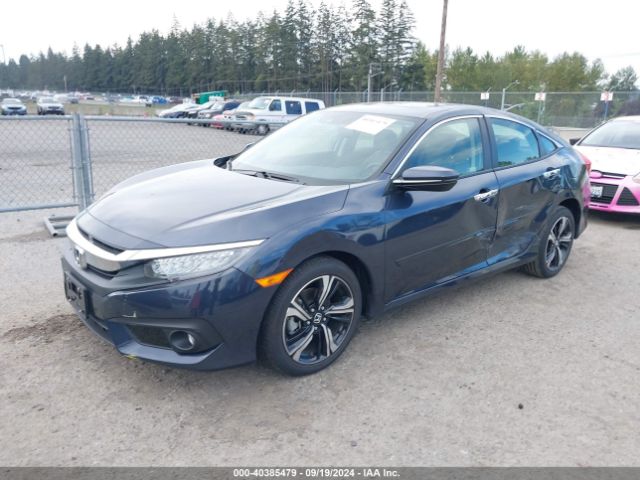 JHMFC1F94JX008591 Honda Civic Touring