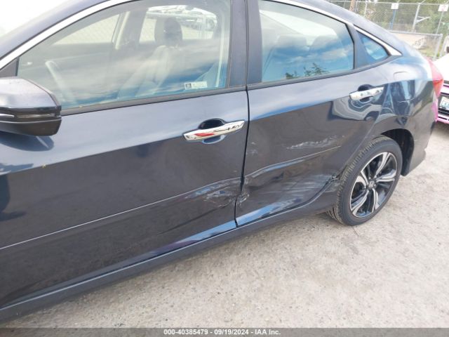 JHMFC1F94JX008591 Honda Civic Touring