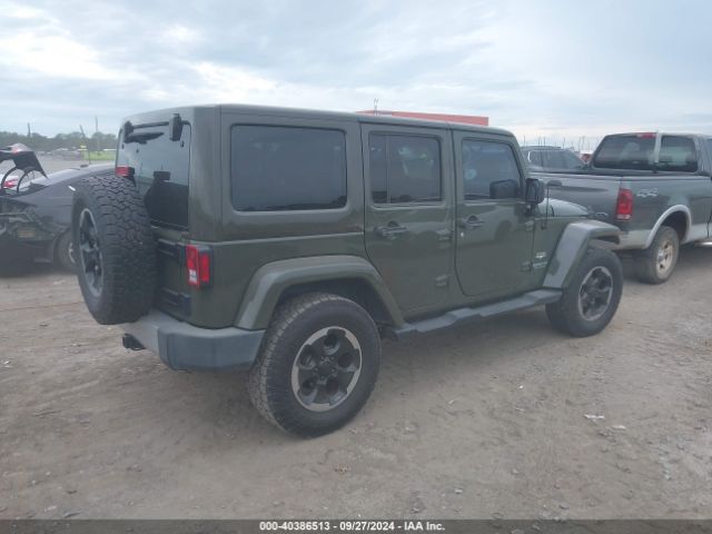 1C4BJWEG8FL588591 Jeep Wrangler Unlimited Sahara