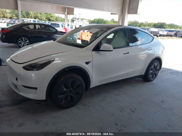 2024 TESLA MODEL Y 7SAYGDED3RF115792 Photo 1