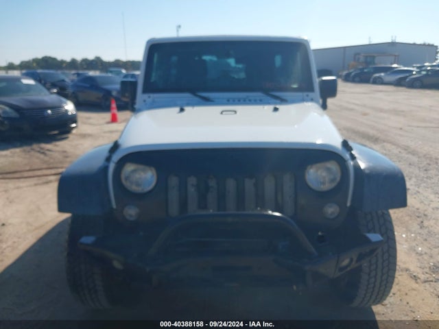 1C4BJWDG2EL290649 Jeep Wrangler Unlimited Sport