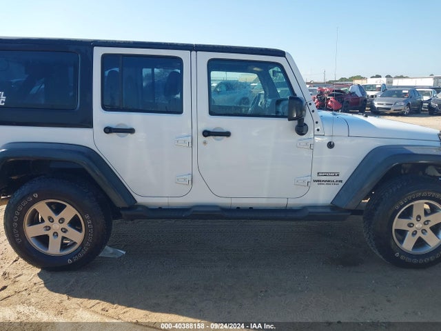 1C4BJWDG2EL290649 Jeep Wrangler Unlimited Sport