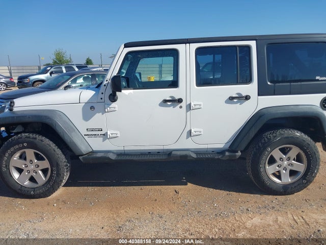 1C4BJWDG2EL290649 Jeep Wrangler Unlimited Sport