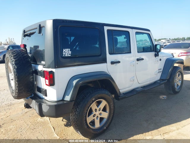 1C4BJWDG2EL290649 Jeep Wrangler Unlimited Sport