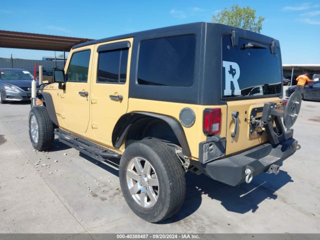 1C4BJWDG4EL227939 Jeep Wrangler Unlimited Sport