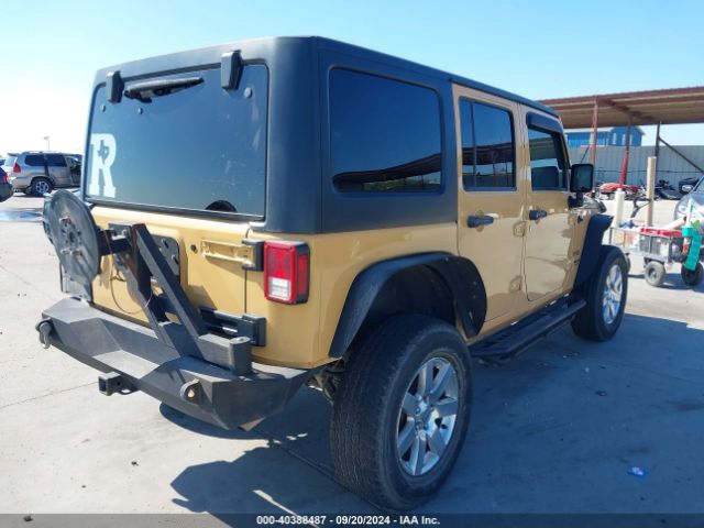 1C4BJWDG4EL227939 Jeep Wrangler Unlimited Sport