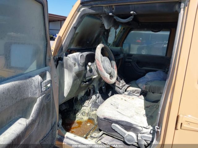 1C4BJWDG4EL227939 Jeep Wrangler Unlimited Sport