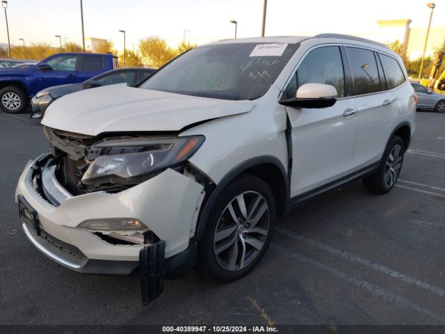 5FNYF6H07HB039061 Honda Pilot Elite