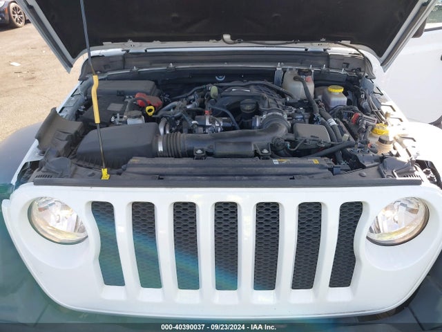 1C4HJXDGXPW615100 Jeep Wrangler 4-door Sport S 4x4