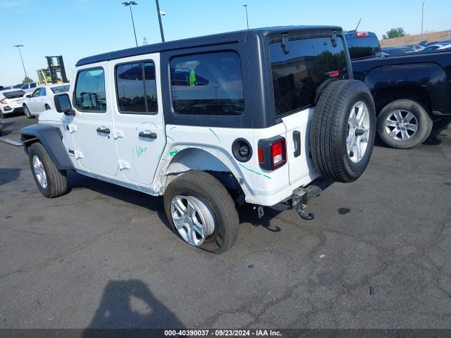 1C4HJXDGXPW615100 Jeep Wrangler 4-door Sport S 4x4