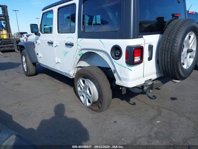 1C4HJXDGXPW615100 Jeep Wrangler 4-door Sport S 4x4