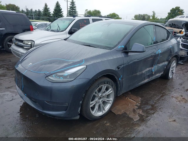 2023 TESLA MODEL Y 7SAYGDEE3PF878417 Photo 1