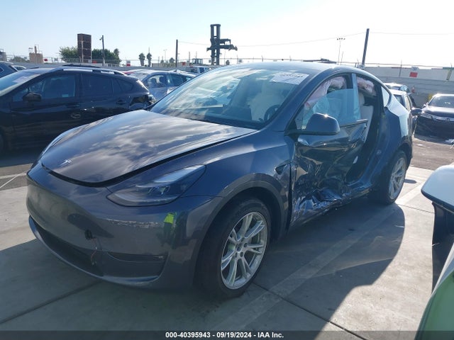 2023 TESLA MODEL Y 7SAYGDEE8PF920614 Photo 1