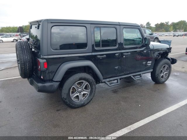 1C4HJXDG2JW124706 Jeep Wrangler Unlimited Sport S 4x4