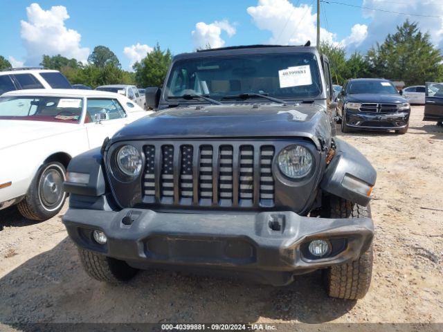 1C4HJXDG7JW140027 Jeep Wrangler Unlimited Sport 4x4