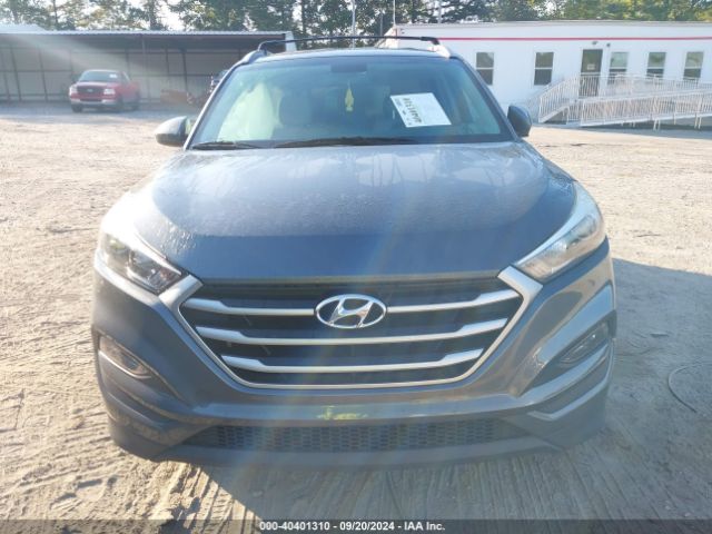 KM8J33A44HU517820 Hyundai TUCSON SE