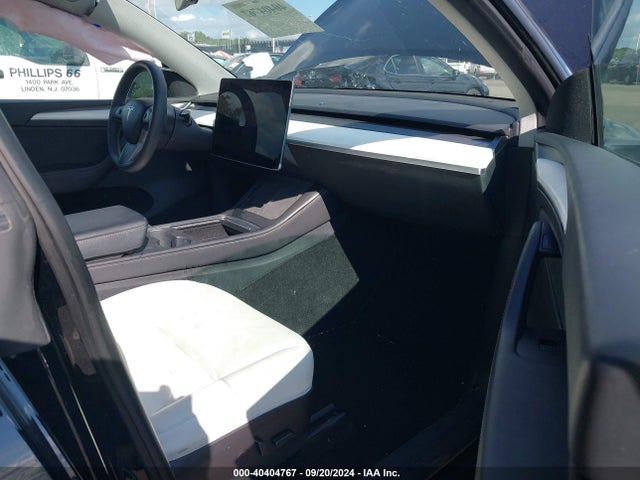 2023 TESLA MODEL Y 7SAYGDEE7PF682531 Photo 4