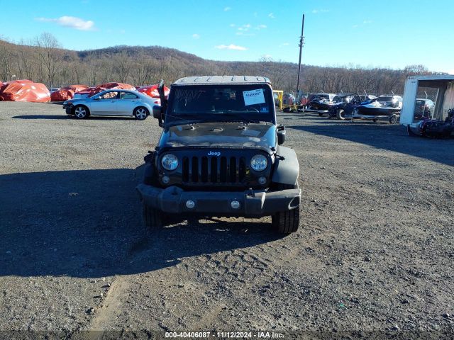 1C4GJWAG2GL311898 Jeep Wrangler Sport