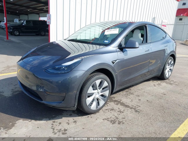 2023 TESLA MODEL Y 7SAYGDEE2PA199025 Photo 1