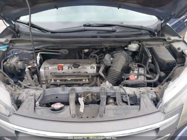 2HKRM4H32EH635328 Honda CR-V LX