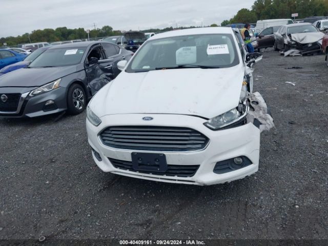 3FA6P0H94ER338104 Ford FUSION SE