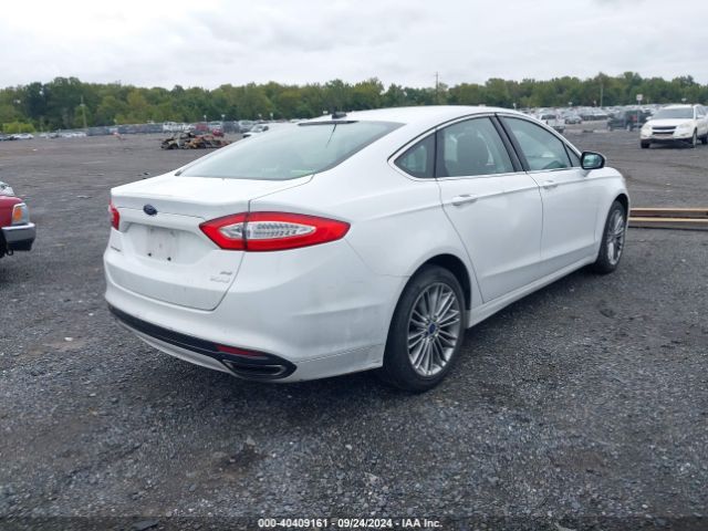 3FA6P0H94ER338104 Ford FUSION SE