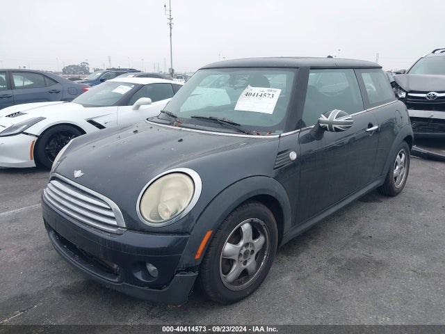 2009 MINI COOPER WMWMF335X9TU70229 Photo 1