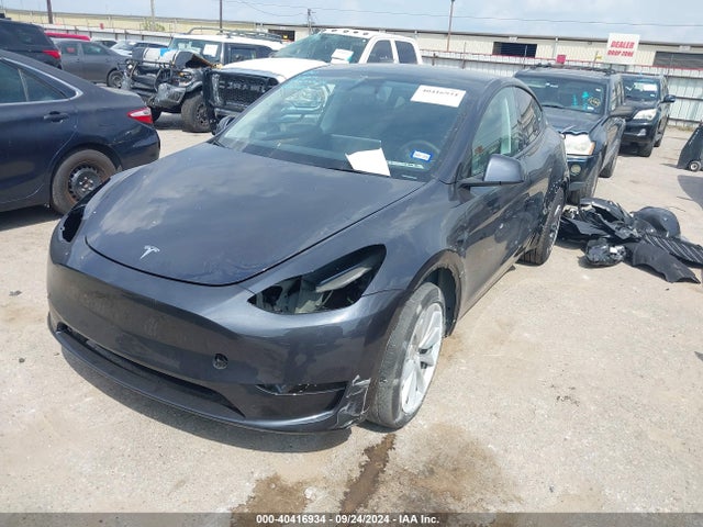 2024 TESLA MODEL Y 7SAYGDED3RA304830 Photo 1