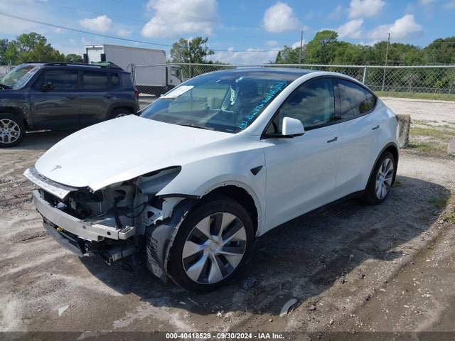 2021 TESLA MODEL Y 5YJYGDED9MF111297 Photo 1
