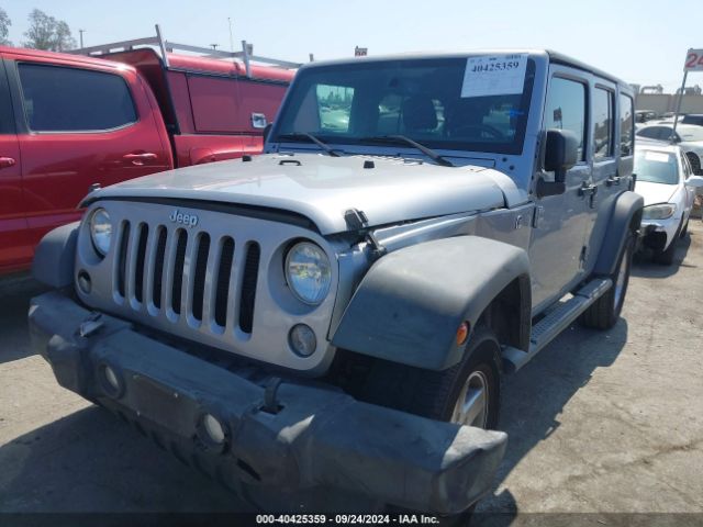1C4BJWDG4GL138147 Jeep Wrangler Unlimited Sport