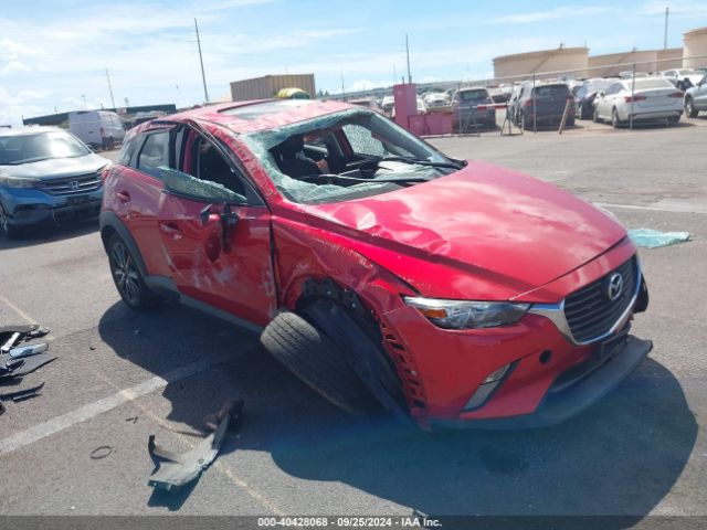 JM1DKFC76H0154053 Mazda Cx-3 Touring