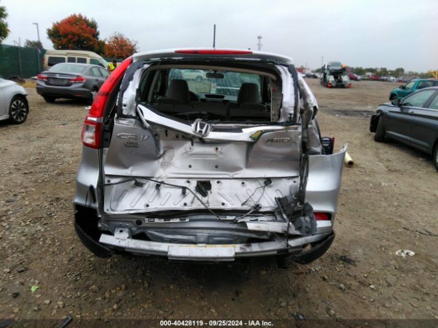 2HKRM4H32GH610707 Honda CR-V LX