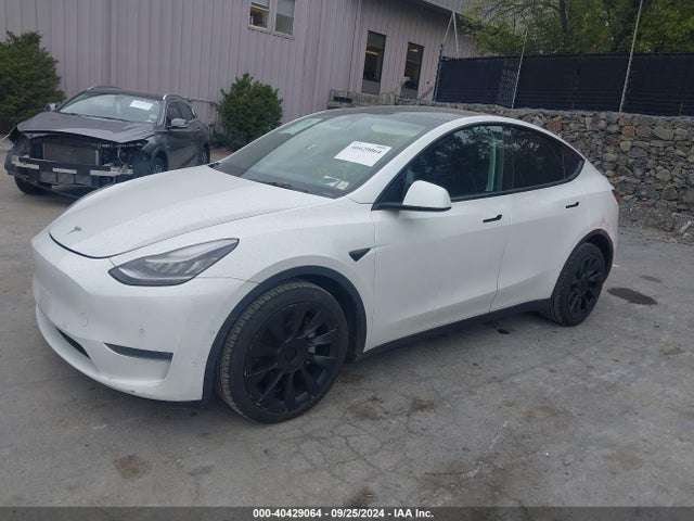 2021 TESLA MODEL Y 5YJYGDEE4MF090674 Photo 1