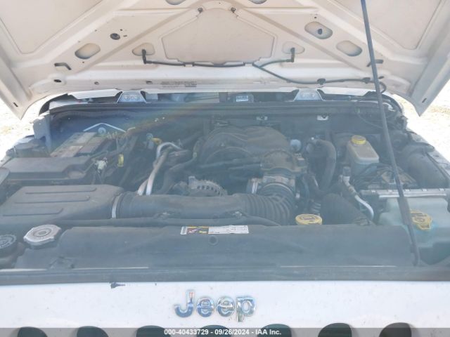 1C4HJWDG7EL134584 Jeep Wrangler Unlimited Sport