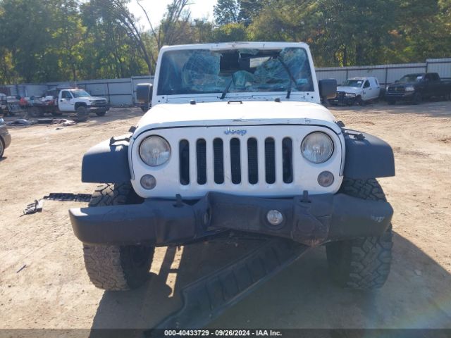 1C4HJWDG7EL134584 Jeep Wrangler Unlimited Sport