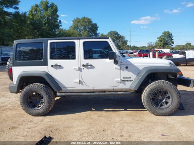 1C4HJWDG7EL134584 Jeep Wrangler Unlimited Sport