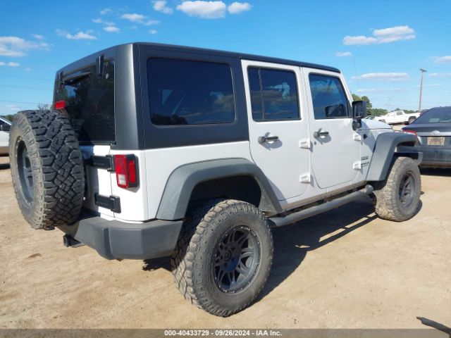 1C4HJWDG7EL134584 Jeep Wrangler Unlimited Sport