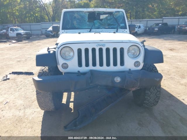1C4HJWDG7EL134584 Jeep Wrangler Unlimited Sport