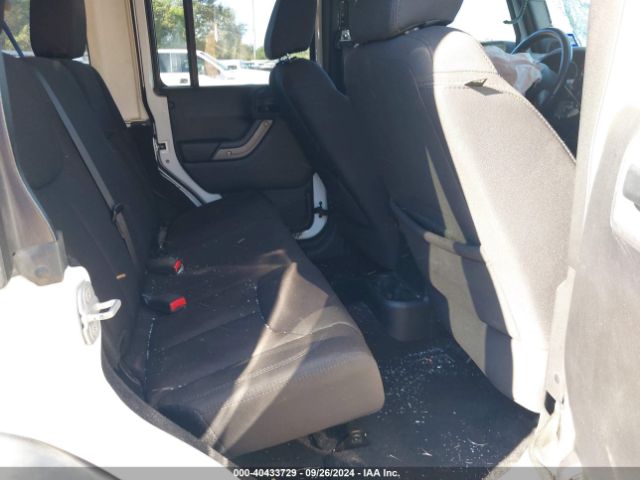 1C4HJWDG7EL134584 Jeep Wrangler Unlimited Sport