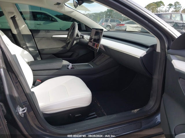 2023 TESLA MODEL 3 5YJ3E1EC9PF612085 Photo 4