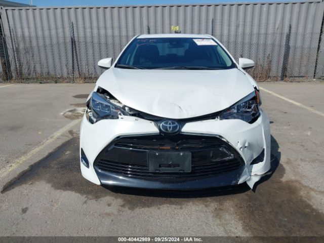 5YFBURHE0KP868901 Toyota Corolla Xle