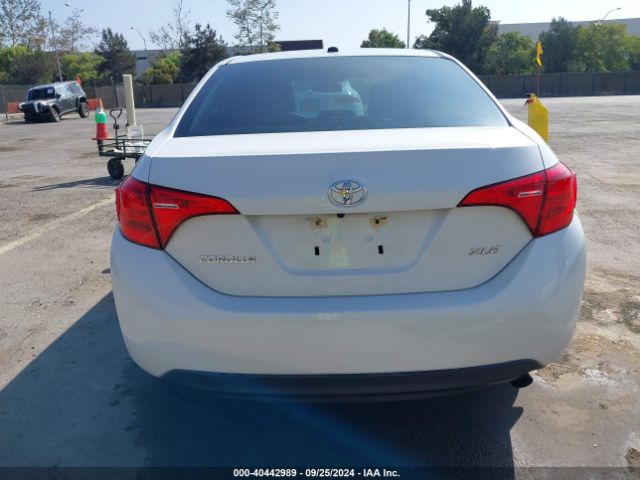 5YFBURHE0KP868901 Toyota Corolla Xle